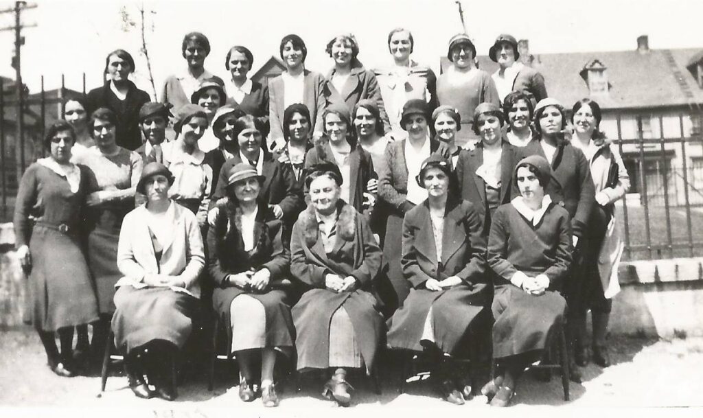 Alice Garrigus and lady workers in Newfoundland.